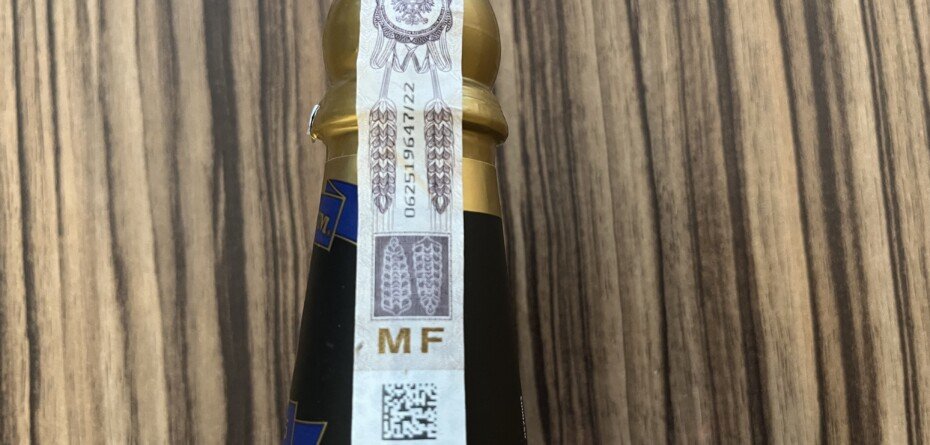 Wyższa akcyza na alkohol, podwyżka akcyzy na alkohol, Banderola akcyzowa na szyjce butelki alkoholu w Polsce